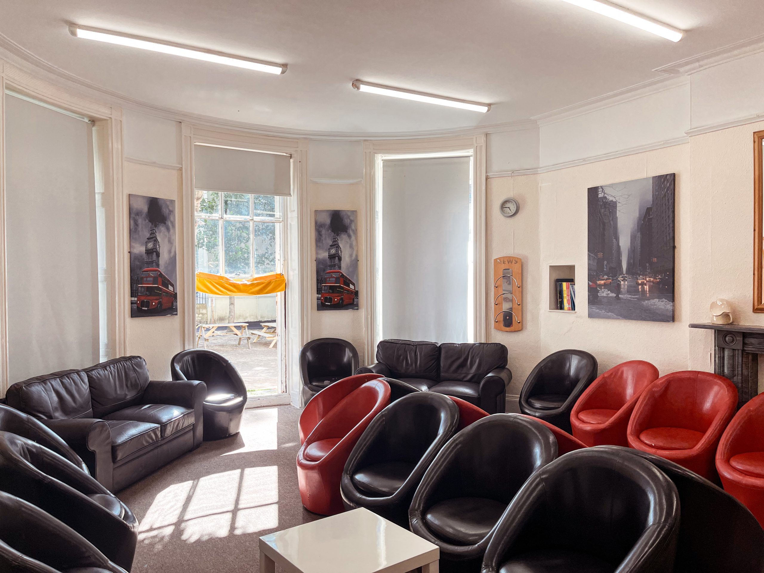 Students relaxing together in the student lounge at inlingua Cheltenham
