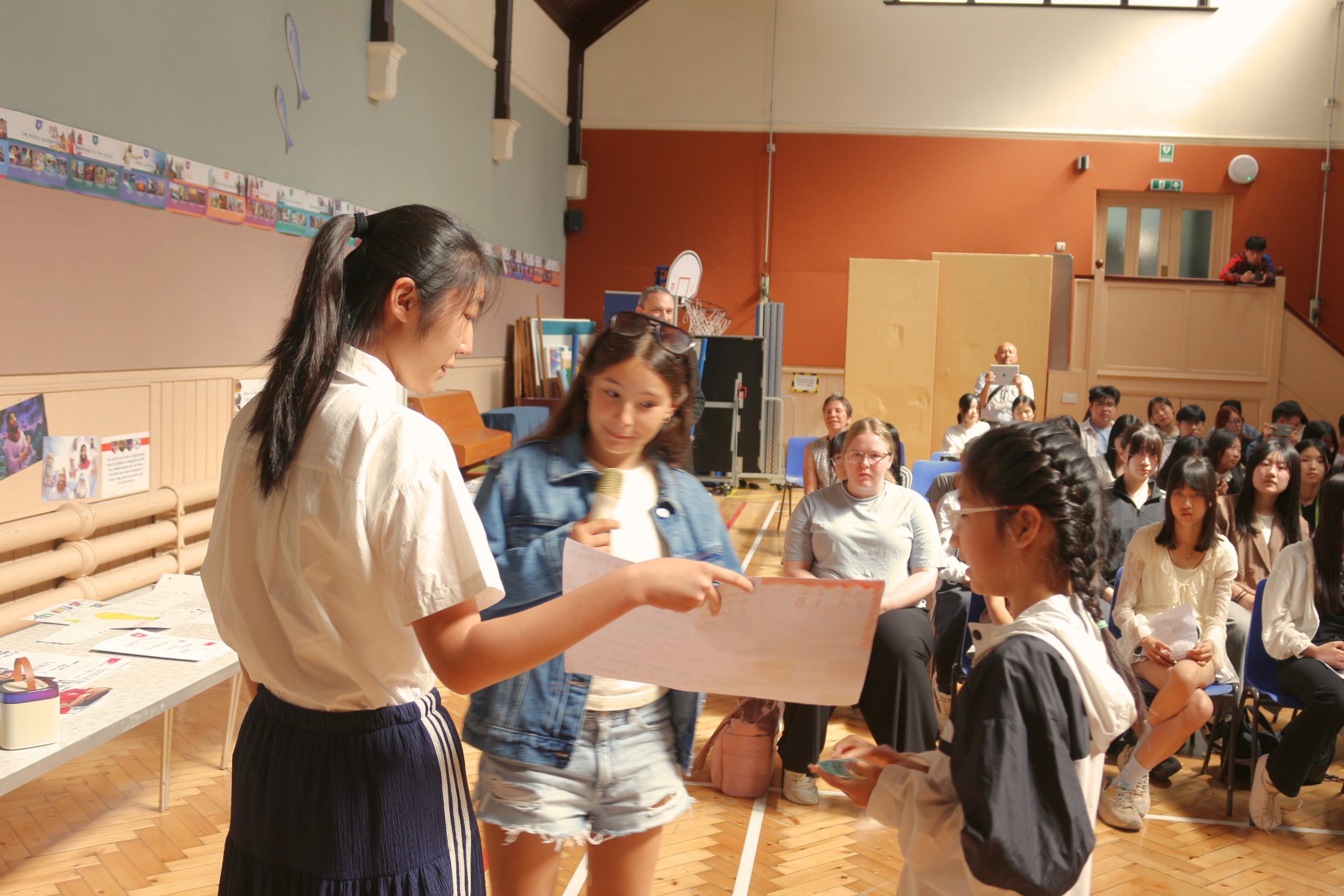 Summer camp students working together in a bright classroom at inlingua Cheltenham