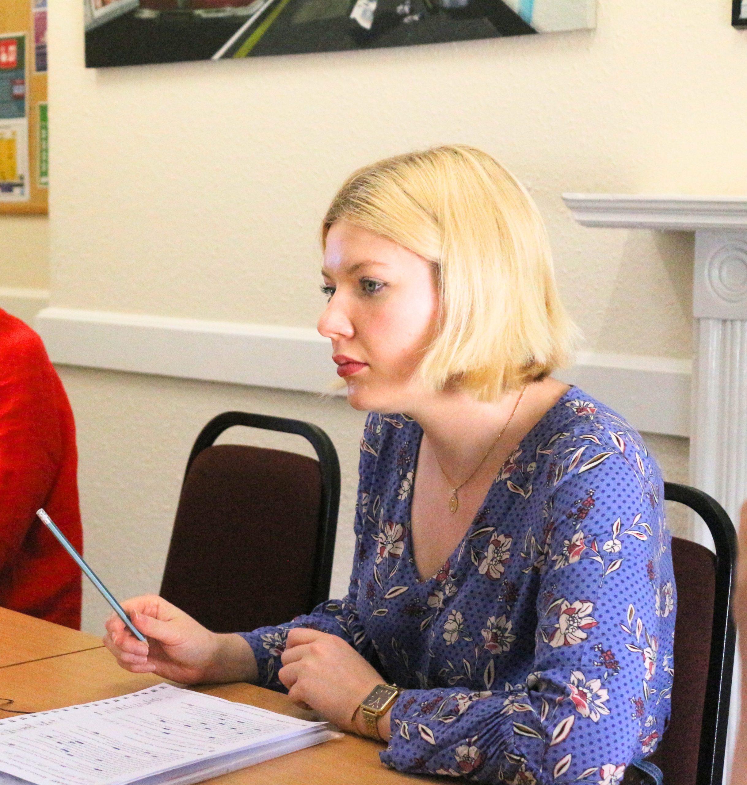 A teacher working one to one with an adult student at inlingua Cheltenham
