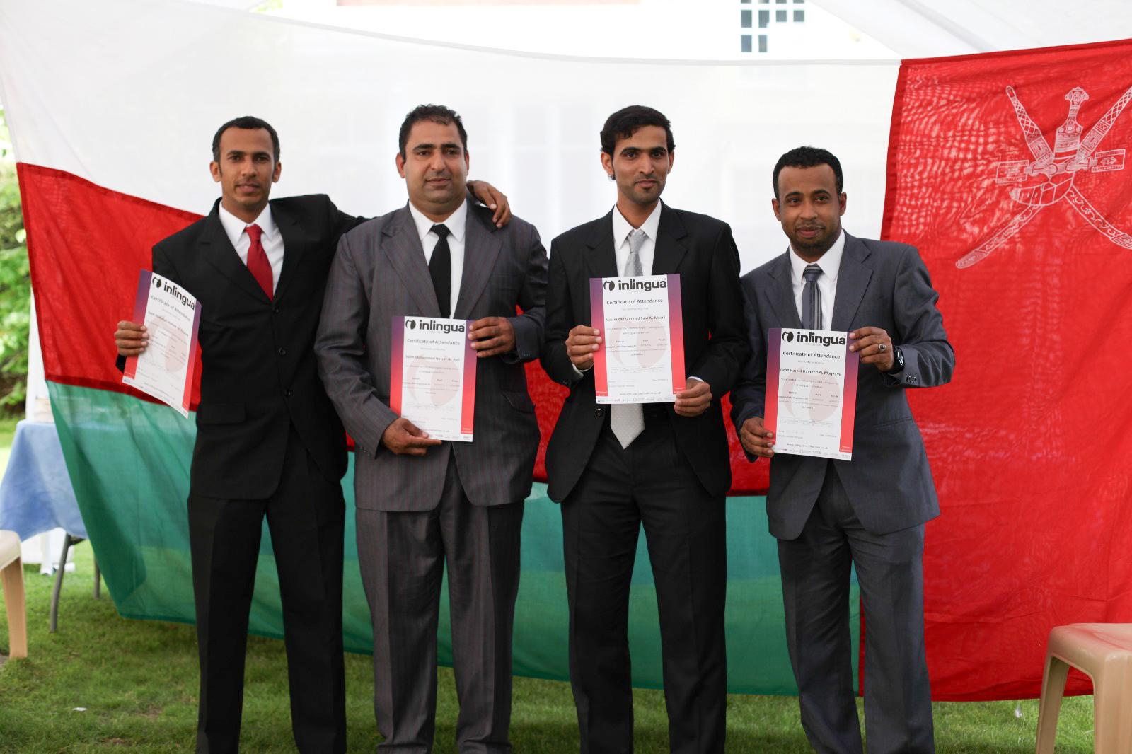 Business English students receiving their certificates at inlingua Cheltenham